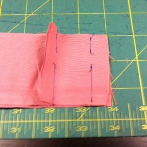 Seams for inseam buttonholes in waistband