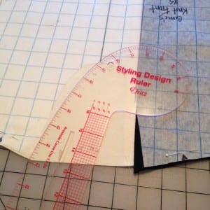 Shaping neckline with Styling Design ruler.