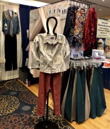 The Eureka! Pants fitting booth, with our girlfriend modeling the Paris Postcard Jean Jacket.