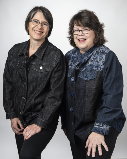 Rae and Carrie model their jean jackets